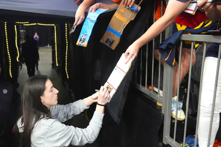 WNBA commish at odds with growing business